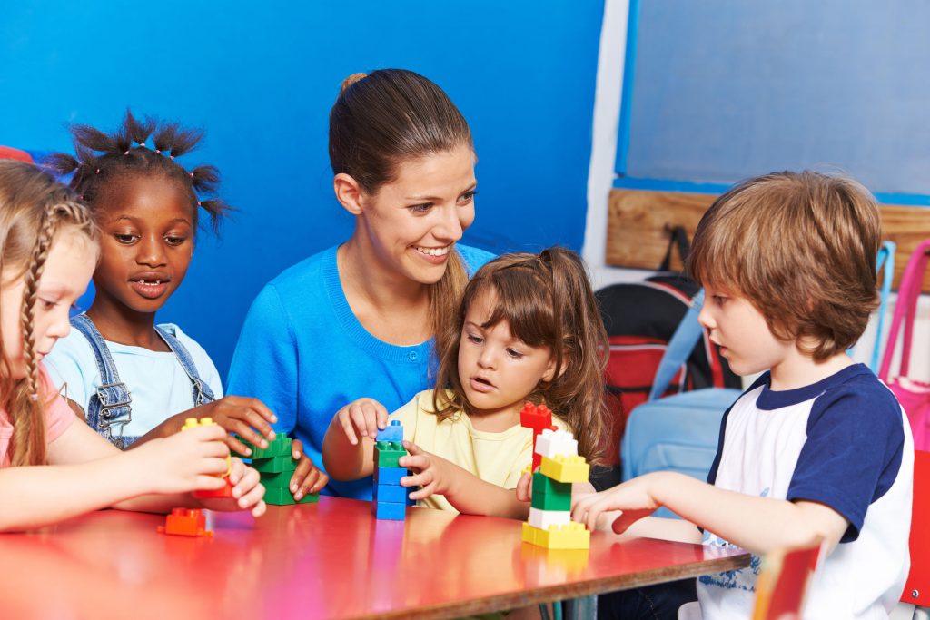 children playing in child care in after-school care club