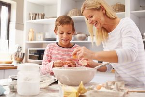 Mother and son baking together at home | Walton Academy