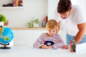 Father and Son Learning at Home | Walton Academy